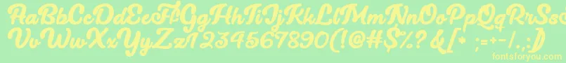 Lucy The Cat   Font – Yellow Fonts on Green Background