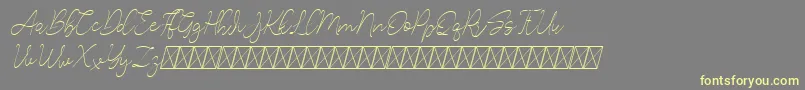 Lucylane Slant Font – Yellow Fonts on Gray Background