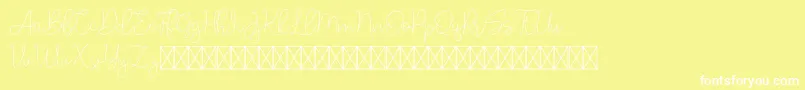 フォントLucylane – 黄色い背景に白い文字