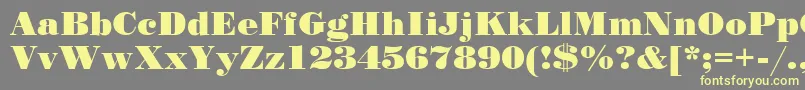 StandardposterCyrillic-fontti – keltaiset fontit harmaalla taustalla