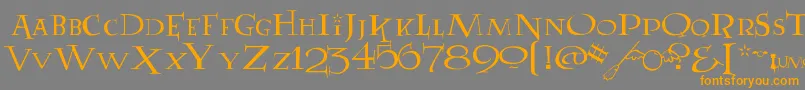 フォントLUMOS – オレンジの文字は灰色の背景にあります。