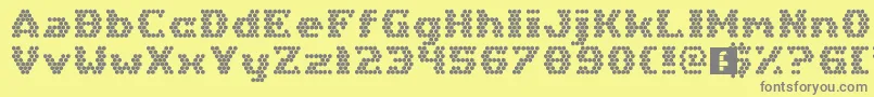 Fonte HexGirlfriend – fontes cinzas em um fundo amarelo