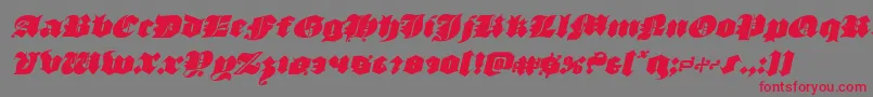 フォントluxcontratenebrasital – 赤い文字の灰色の背景