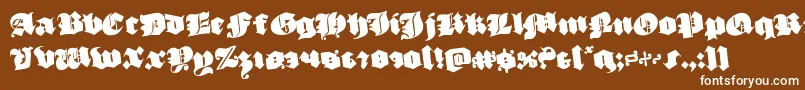 luxcontratenebrasrotate Font – White Fonts on Brown Background
