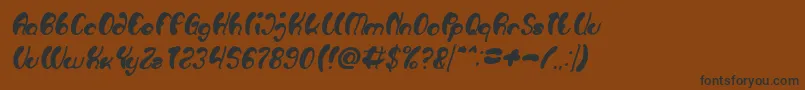 フォントLuxurious Sexy Bold Italic – 黒い文字が茶色の背景にあります