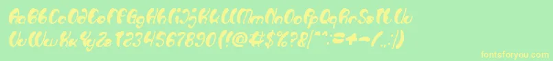 Luxurious Sexy Bold Italic-fontti – keltaiset fontit vihreällä taustalla