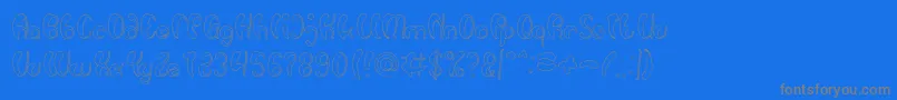 Шрифт Luxurious Sexy Hollow – серые шрифты на синем фоне