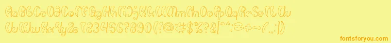 Шрифт Luxurious Sexy Hollow – оранжевые шрифты на жёлтом фоне