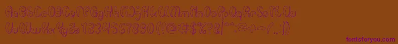 Шрифт Luxurious Sexy Hollow – фиолетовые шрифты на коричневом фоне