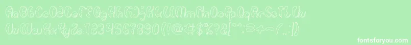 Luxurious Sexy Hollow-fontti – valkoiset fontit vihreällä taustalla
