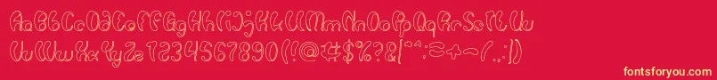 Luxurious Sexy Hollow-fontti – keltaiset fontit punaisella taustalla