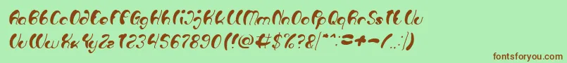 Fonte Luxurious Sexy Italic – fontes marrons em um fundo verde