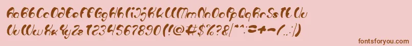 Шрифт Luxurious Sexy Italic – коричневые шрифты на розовом фоне