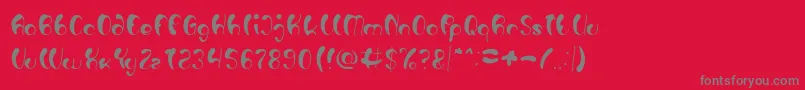 フォントLuxurious Sexy Light – 赤い背景に灰色の文字