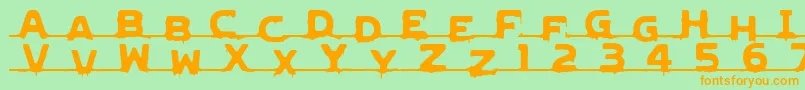 フォントLVDCG    – オレンジの文字が緑の背景にあります。