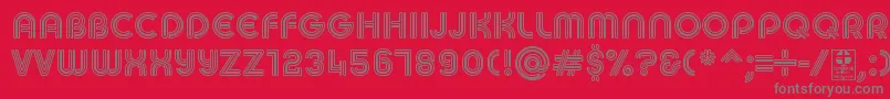 MACCOS REGULAR Demo-Schriftart – Graue Schriften auf rotem Hintergrund