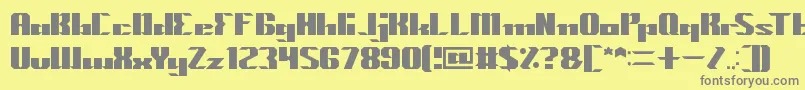 MACHINE GUN-Schriftart – Graue Schriften auf gelbem Hintergrund