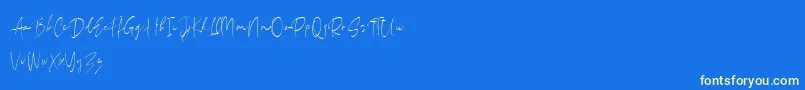 MackleScript Regular DEMO-Schriftart – Gelbe Schriften auf blauem Hintergrund
