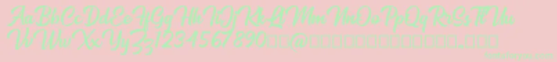 Mackless Script Font – Green Fonts on Pink Background