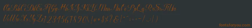 フォントMacrofhyllya Script – 黒い背景に茶色のフォント