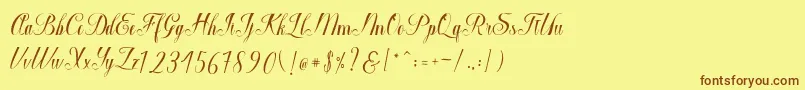 Fonte Macrofhyllya Script – fontes marrons em um fundo amarelo