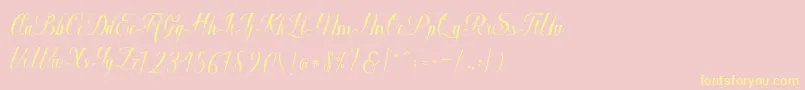 Macrofhyllya Script Font – Yellow Fonts on Pink Background