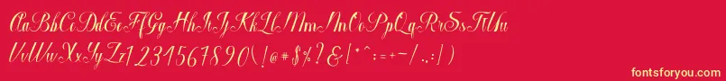 フォントMacrofhyllya Script – 黄色の文字、赤い背景