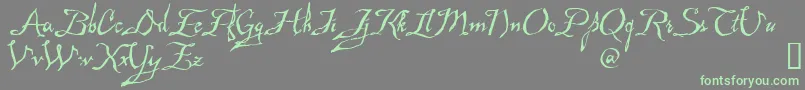 MAD     -Schriftart – Grüne Schriften auf grauem Hintergrund