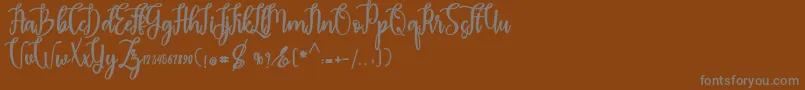 Шрифт madam – серые шрифты на коричневом фоне