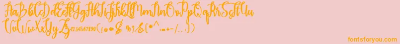 madam Font – Orange Fonts on Pink Background