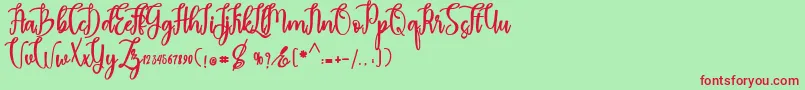 フォントmadam – 赤い文字の緑の背景