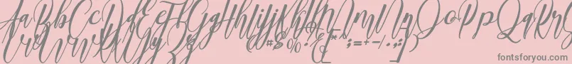 madani Font – Gray Fonts on Pink Background