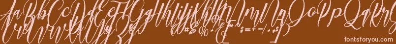 madani-Schriftart – Rosa Schriften auf braunem Hintergrund