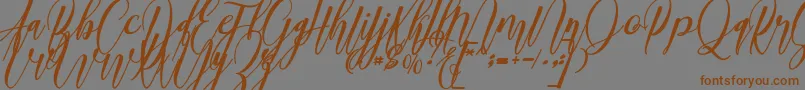 madani Font – Brown Fonts on Gray Background