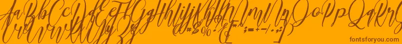 madani Font – Brown Fonts on Orange Background