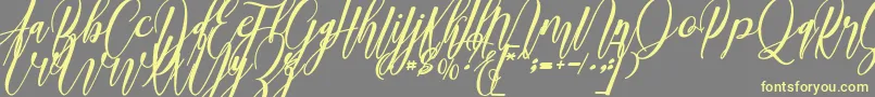 madani Font – Yellow Fonts on Gray Background