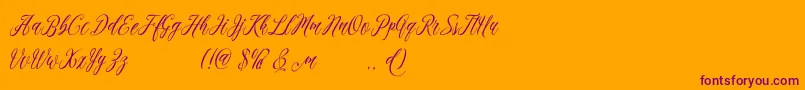 madania free-Schriftart – Violette Schriften auf orangefarbenem Hintergrund