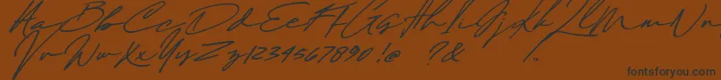 フォントMaddison Signature DEMO – 黒い文字が茶色の背景にあります