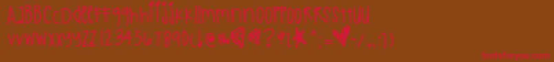 Justkidding-fontti – punaiset fontit ruskealla taustalla