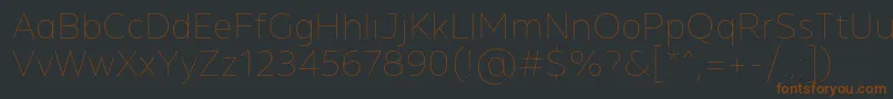 Шрифт MADE Future X Line PERSONAL USE – коричневые шрифты на чёрном фоне