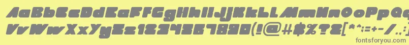 MADE IN EARTH Italic-fontti – harmaat kirjasimet keltaisella taustalla
