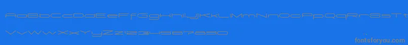 Madeleine-fontti – harmaat kirjasimet sinisellä taustalla