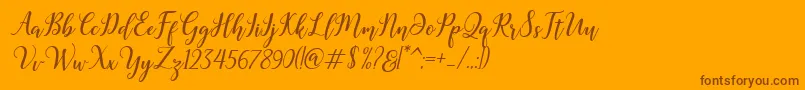 Madelina Bold-Schriftart – Braune Schriften auf orangefarbenem Hintergrund