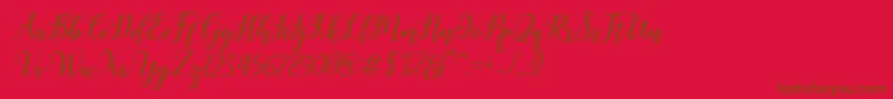 Madelina Bold-Schriftart – Braune Schriften auf rotem Hintergrund