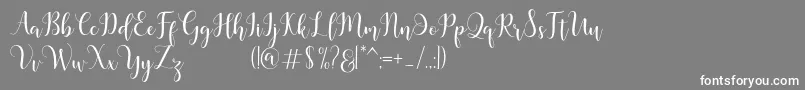 フォントMadelina – 灰色の背景に白い文字