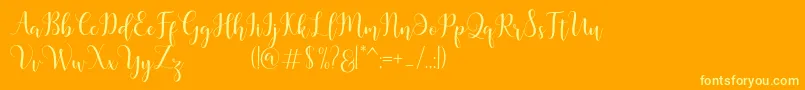 フォントMadelina – オレンジの背景に黄色の文字