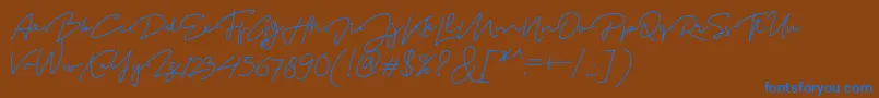 MadelonScript Font – Blue Fonts on Brown Background