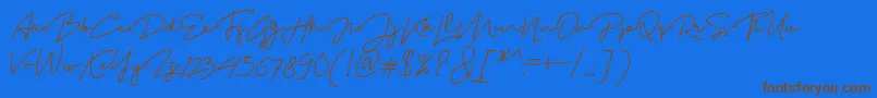 フォントMadelonScript – 茶色の文字が青い背景にあります。