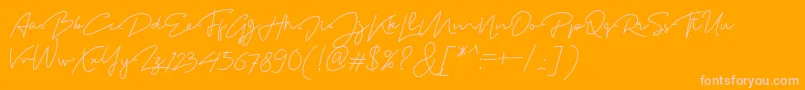 MadelonScript-fontti – vaaleanpunaiset fontit oranssilla taustalla