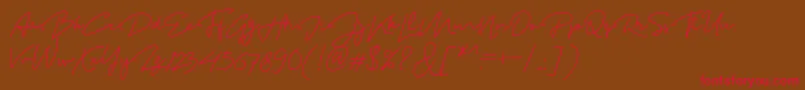 MadelonScript-Schriftart – Rote Schriften auf braunem Hintergrund